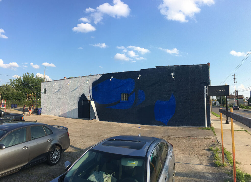Progress shot of the mural. First colors have been laid down.